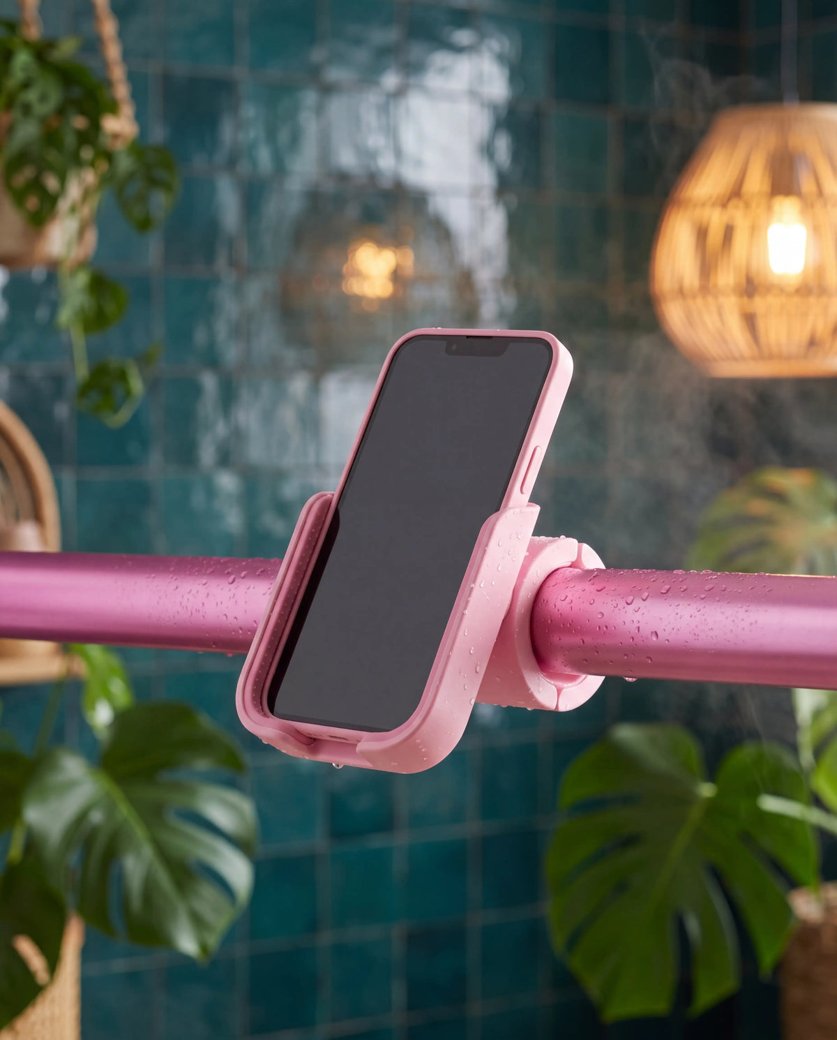 Pink Showrz phone holder that clips onto the rail