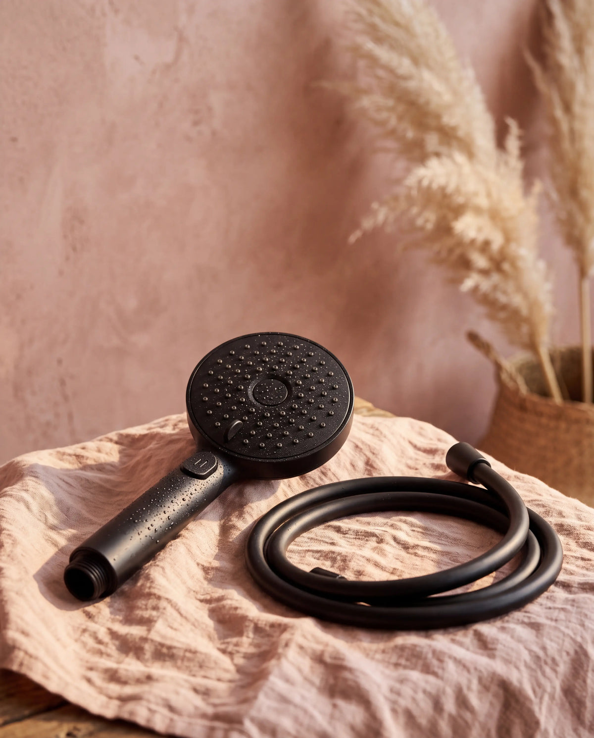 Matte Black Showrz shower head with matching hose