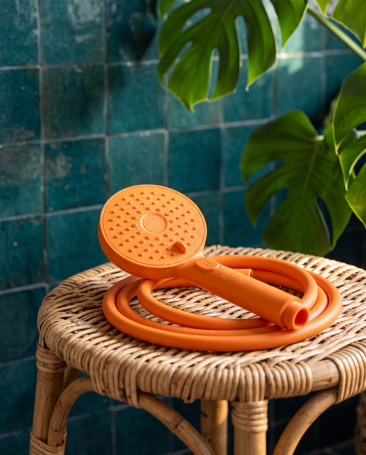 Tangerine Showrz shower head with matching hose