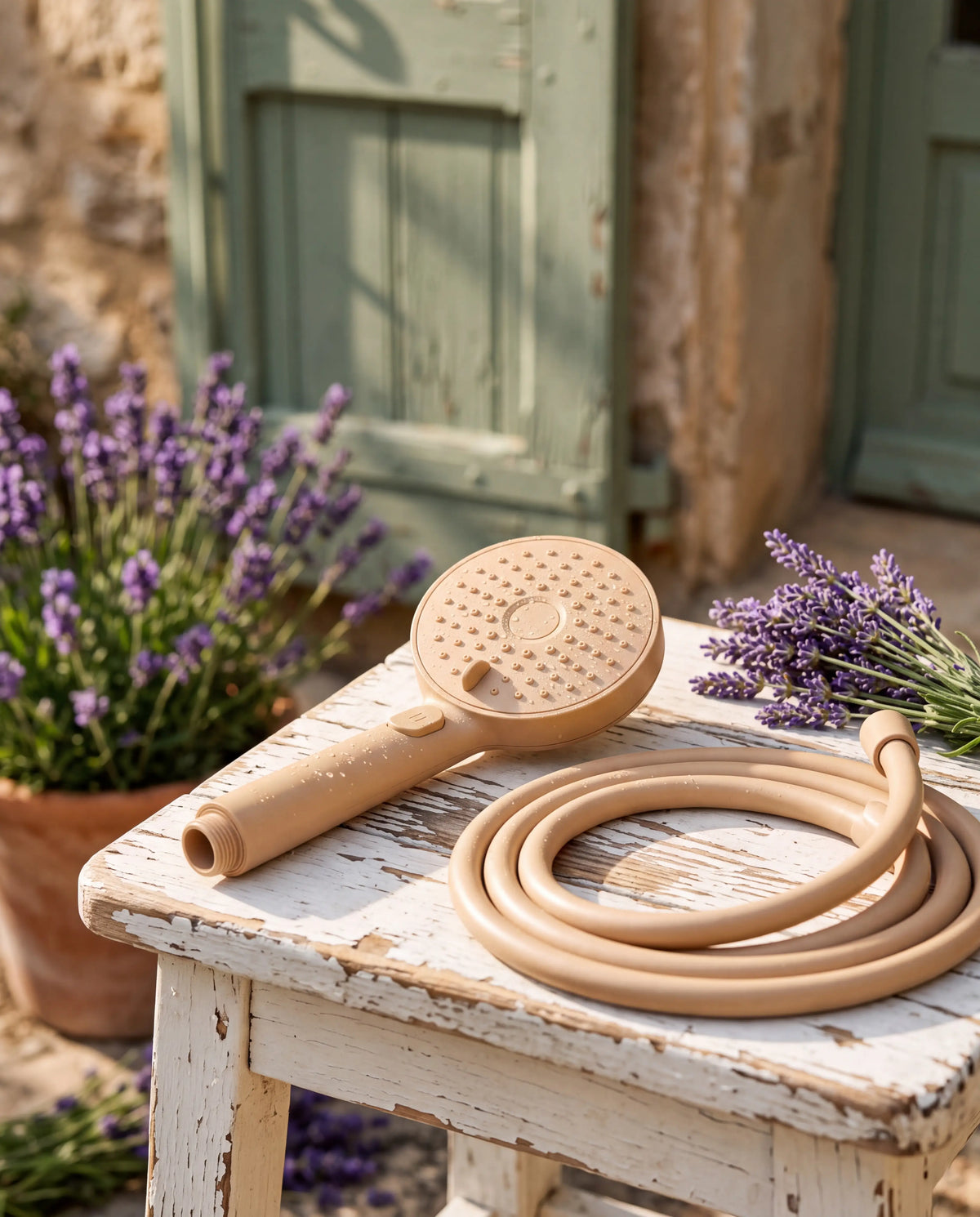 Beige Showrz shower head with matching hose