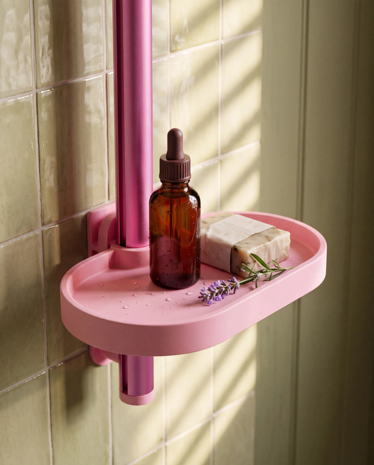 Pink Showrz shower shelf that clips onto the rail