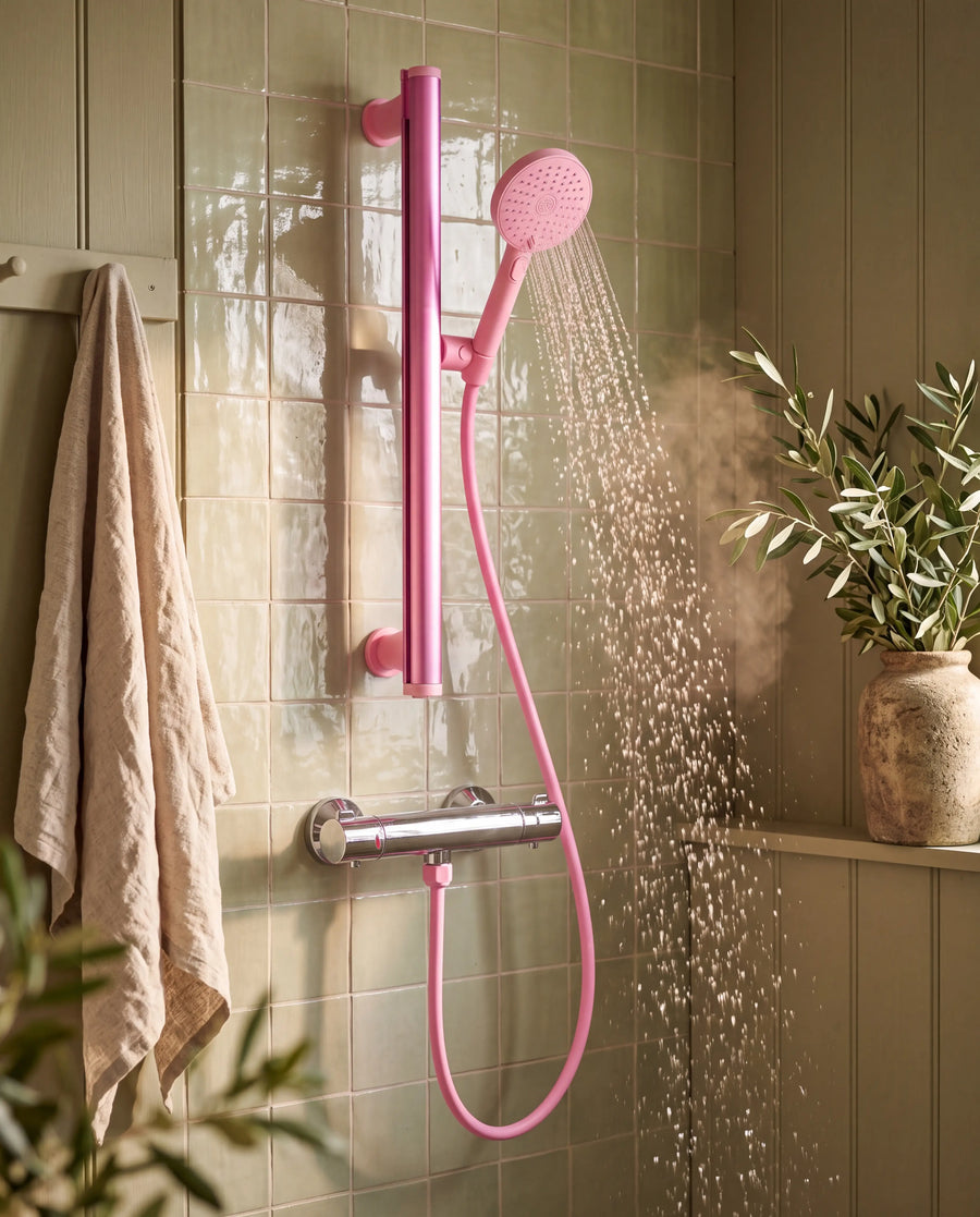 Pink Showrz Rail Kit, no-drill, in a Provençal shower with olive green panelling